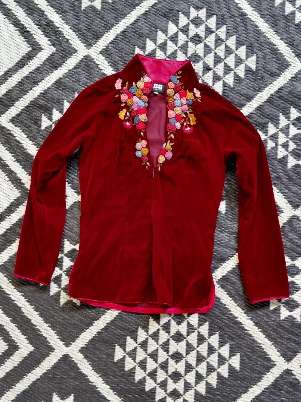 MINH HANH deep red velvet jacket featuring vibrant, multi-colored floral embroid